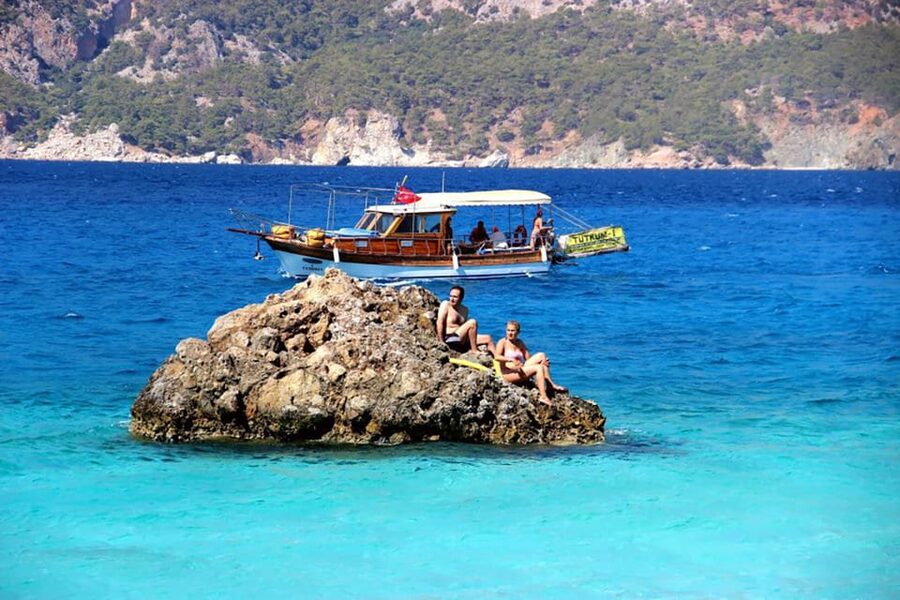 Adrasan Suluada Guided Boat Tour with Lunch - Suluada Beach swim time, photo breaks, and crowd management