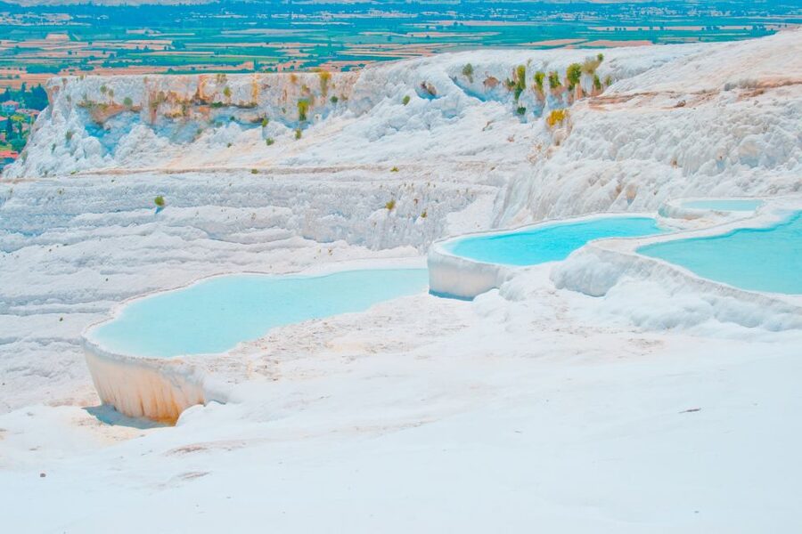 Antalya: Pamukkale Hot Springs & Hierapolis Small Group Tour - Hierapolis: the holy city ruins behind the scenery