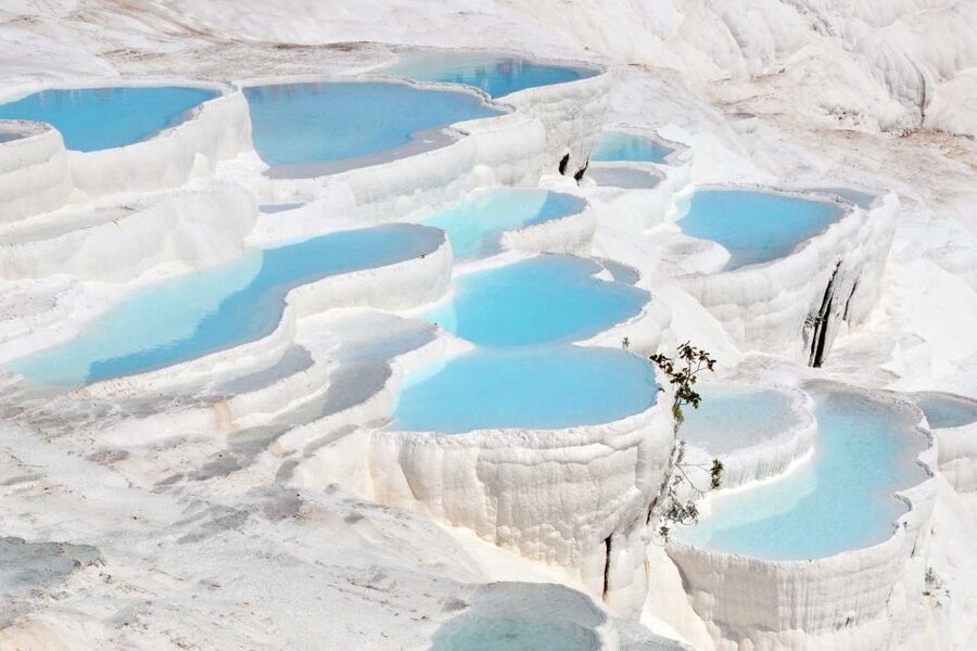 Antalya: Pamukkale Hot Springs & Hierapolis Small Group Tour - Temple of Apollo and the Gate of Domitian: fast history with strong visuals