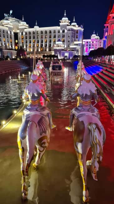 From Alanya: Land of Legends Night Show with Hotel Transfers - Inside the park at night: photos, vibes, and the shopping in between